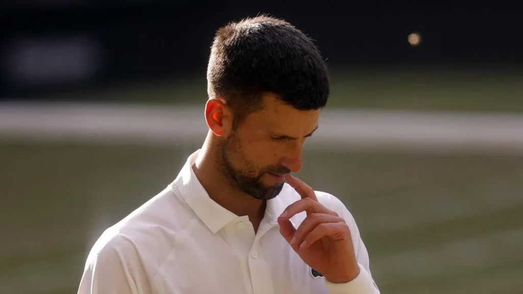 Djokovic - down but not out, vows to carry on