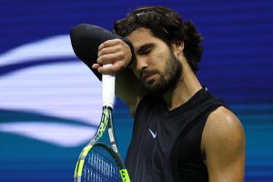 Carlos Alcaraz of Spain reacts against Ben Shelton of the United States during their men's
