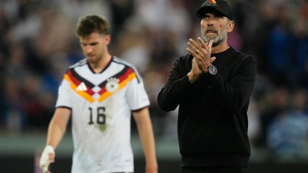 Greece scored a 74th-minute goal through Dimitris Kourbelis to surprises ‌hosts Germany 1-0