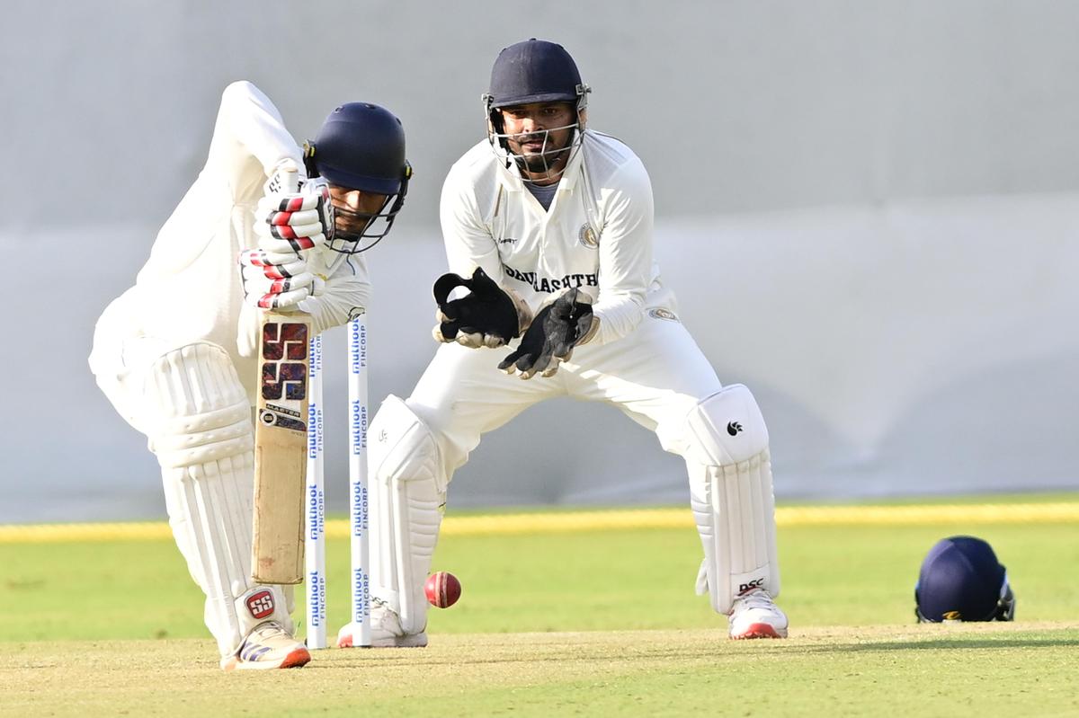 Manvanth Kumar of Karnataka in action against Saurashtra during the Ranji Trophy Elite cricket