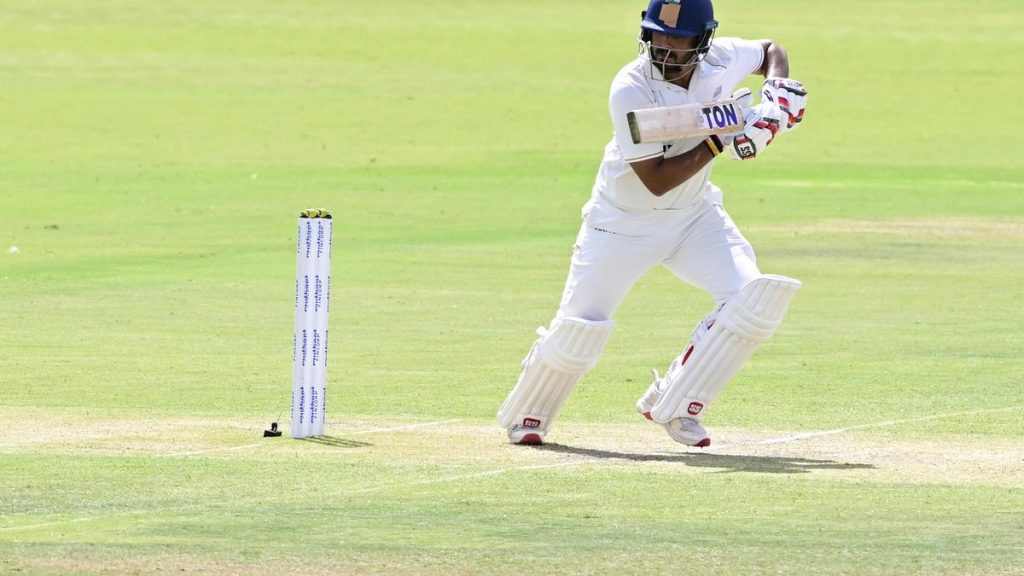 Honours were even between Karnataka and Saurashtra on day two of their Ranji Trophy match
