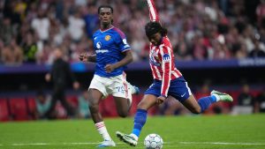 Atletico Madrid eased to a 2-0 victory over Manchester United in the Champions League